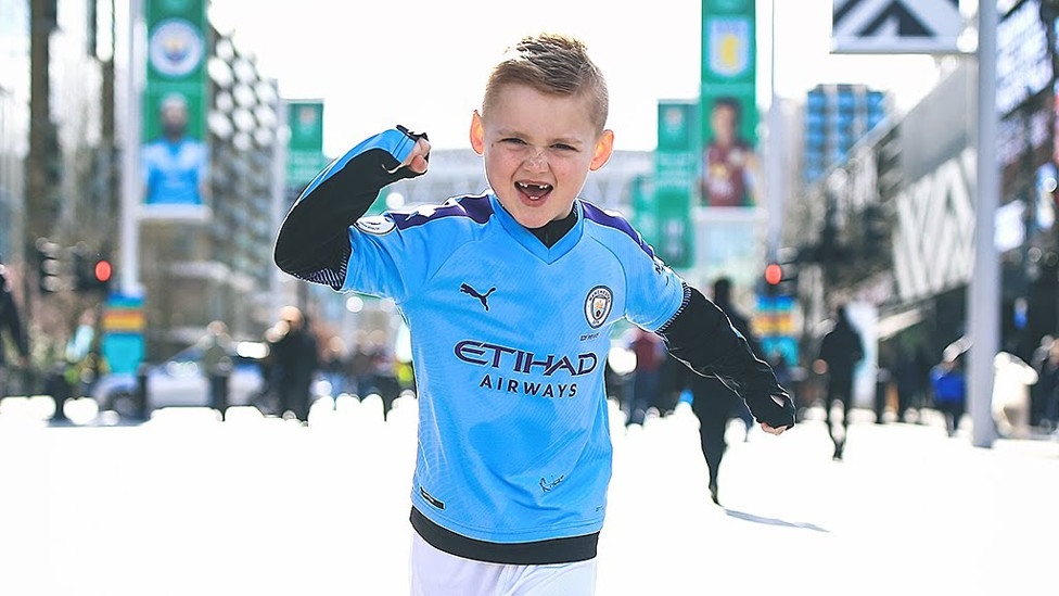 CHEER WE GO: The Wembley excitement started early for this youngster