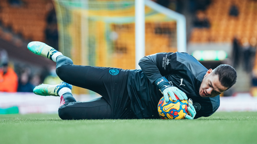 SAFE HANDS : Ederson gets a feel of the ball in the pre-match warmup.