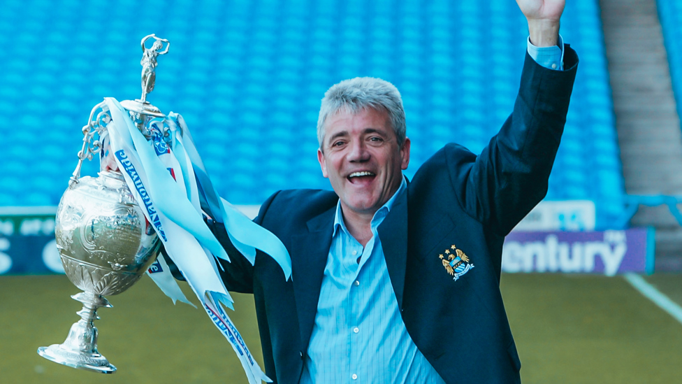 SILVERWARE : Kevin Keegan celebrates with the Division One trophy after guiding City to promotion | 21 April 2002.