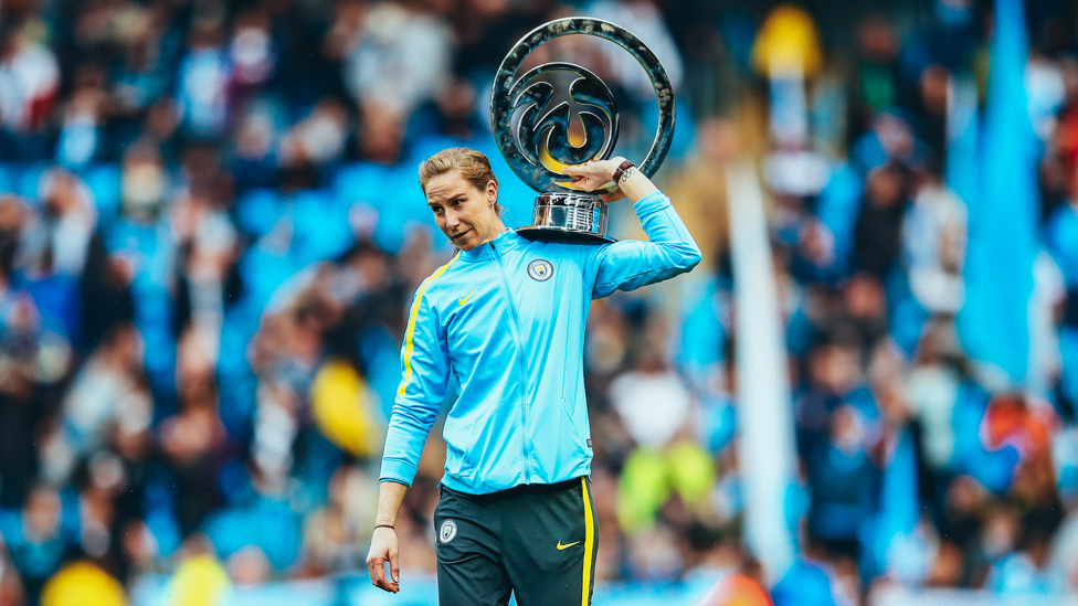 SHOULDER TO CARRY ON : Holding the 2016 Conti Cup aloft at the Etihad Stadium