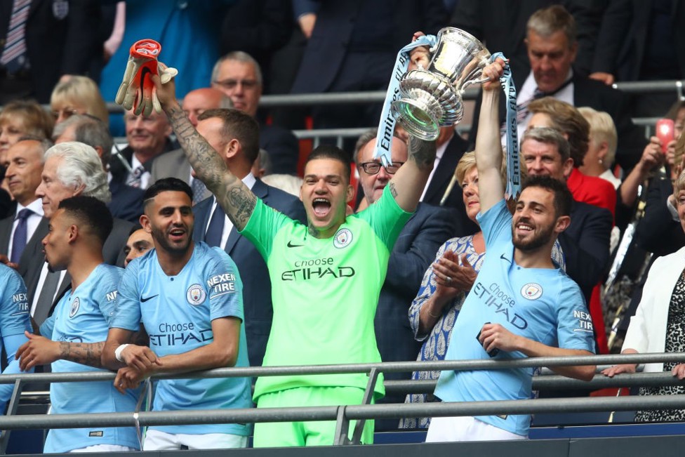 UP FOR THE CUP: Ederson and City celebrate after our 2019 FA Cup final win which sealed our historic Fourmidables campaign