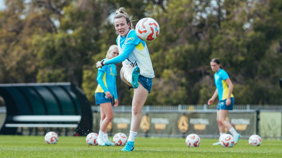 ANGLED HOME : Lauren Hemp strikes with her right foot