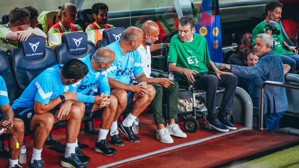 FRIENDS REUNITED : Unzue joins Guardiola and co in the City dugout.