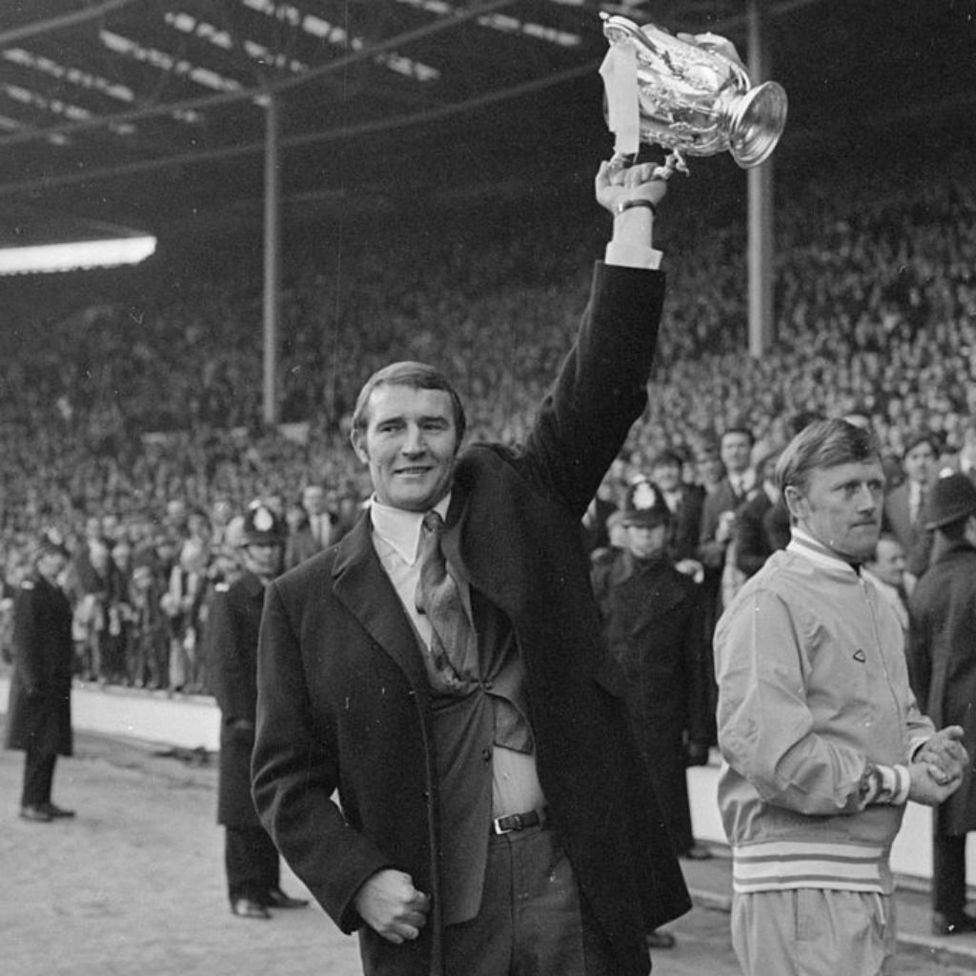 WEMBLEY WONDER: Big Mal holds the League Cup aloft after our 1970 win over West Brom