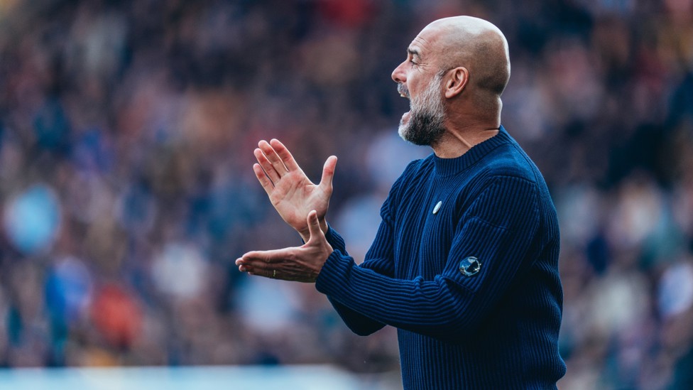 PEP TALK : The boss urging his players on at Molineux