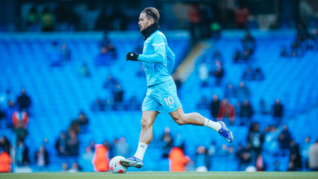 SUPER JACK: Grealish gets in the mood during the pre-match warmup.