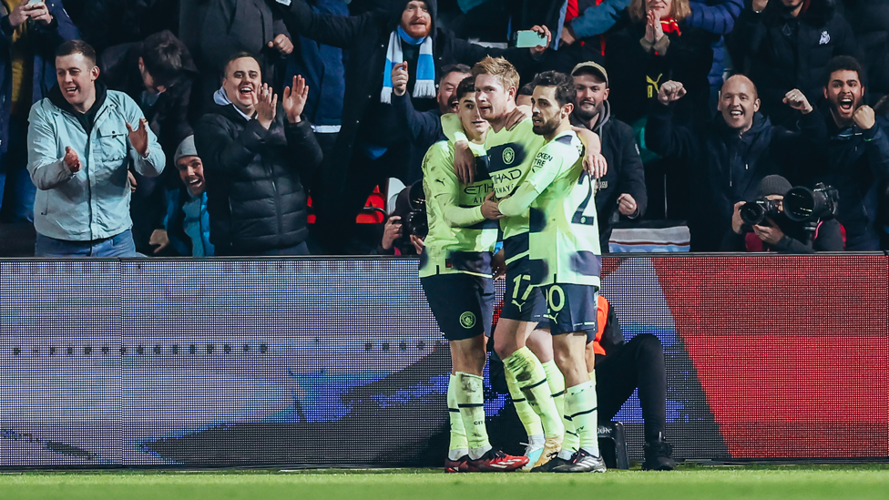 MAKE THAT THREE : KDB celebrates after his superb strike.