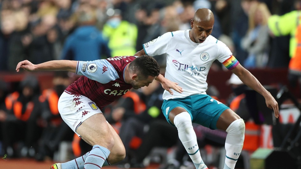 LEADING BY EXAMPLE : Fernandinho, our captain, gets stuck in as he battles with McGinn. 